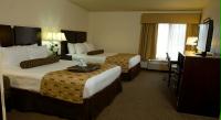 Standard Guest Rooms with 2 Queen Beds include refrigerator, microwave, and flat screen HDTV