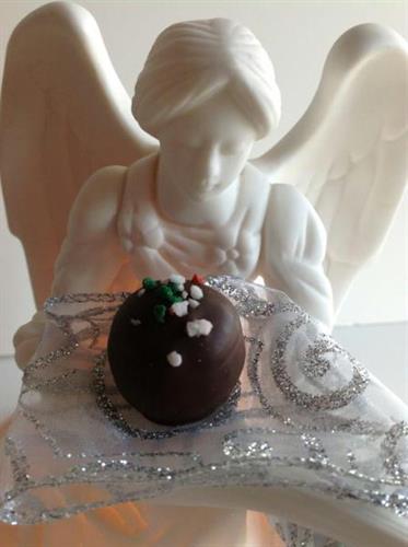 chocolate being held by angel figurine