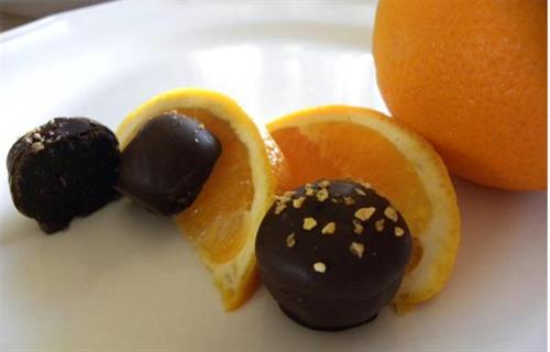 chocolates surrounded by orange slices