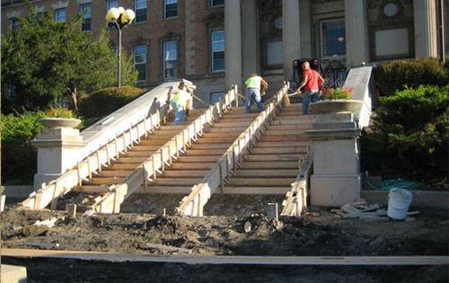 Men working on outdoor stairs
