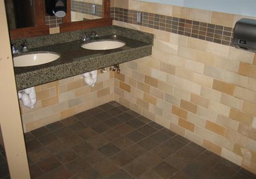 bathroom with tile flooring