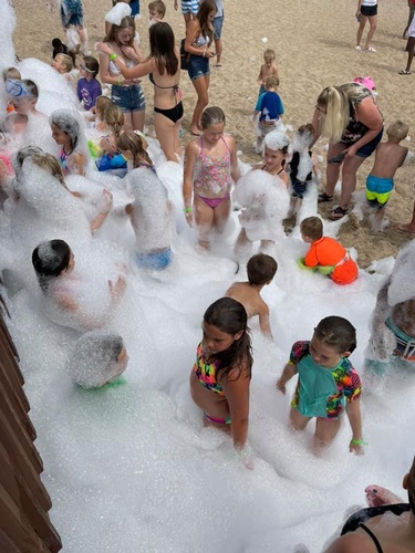 Kids playing in foam