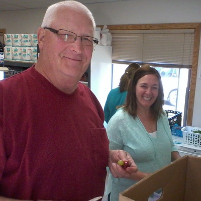 Volunteers smiling at the Sauk Prairie food pantry