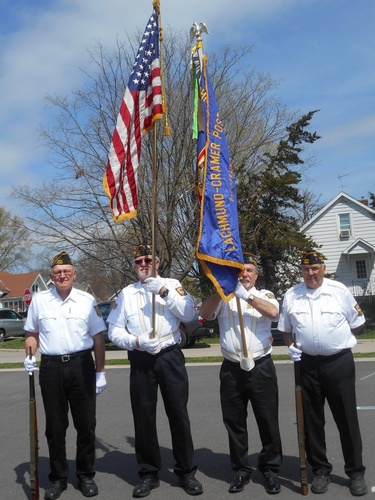 Veterans holding American flag