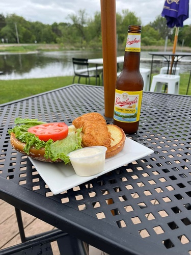 fish sandwich and a beer at sunset harbor bar and grill