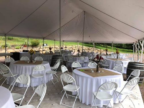 Outdoor wedding reception tables setup at The Vines