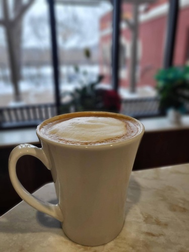 Warm coffee in a mug
