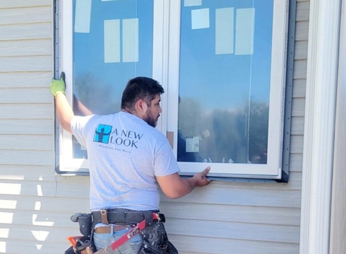 Gallery Image contractor-installing-a-window-for-residential-house_280623-120245.jpg
