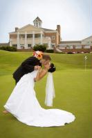 Gallery Image Bride%20and%20Groom%20Kissing%20on%20Golf%20Course.jpg