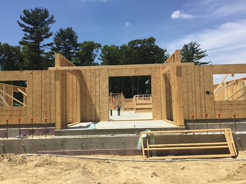 Check out all the construction progress - The walls have gone up and the roof is coming later this week!