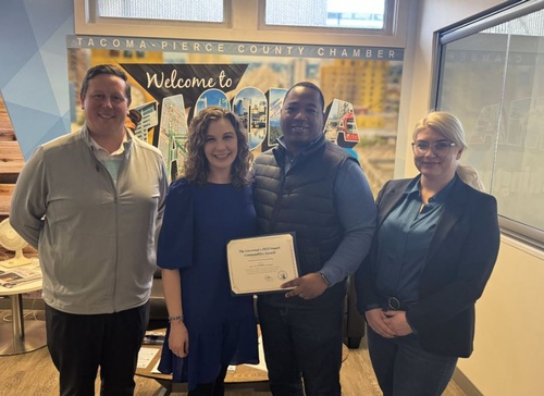 President & CEO Andrea Reay with Chamber Board Members Jon Rossman (Ex-Chair), Kierra Phifer (Chair), and Eli Taylor (Board Member)