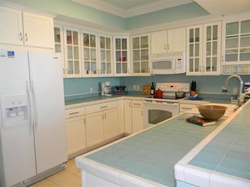 Fully equipped kitchens waiting for your family to enjoy meals together on their Navarre Beach Vacation.