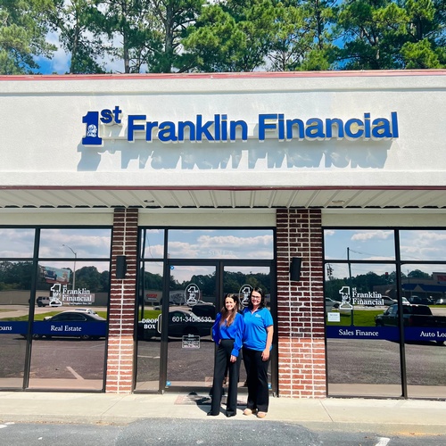 The Manager and Employee outside of 1st Franklin Laurel