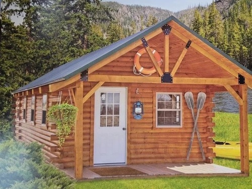 Gallery Image Log_Cabin_with_white_front_door_and_multiple_windows.jpg