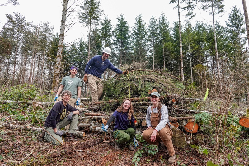 Gallery Image Smiling%20volunteers.%20AmeriCorps%20and%20GPC%20staff%20build%20a%20habitat%20pile.jpg