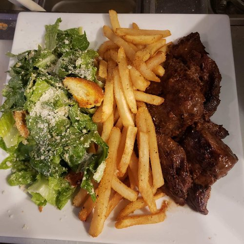 Gallery Image 24_hour_marinated_steak_tips_with_fries_and_Caesar_salad.jpg