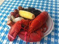 Orleans Seafood Market has fresh live lobsters and will cook them for free.