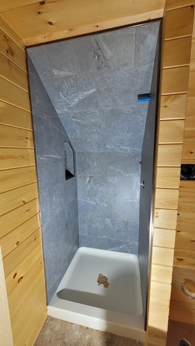 No Showers too small to tile 