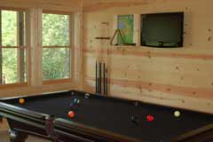 Cabin rentals with Pool table.