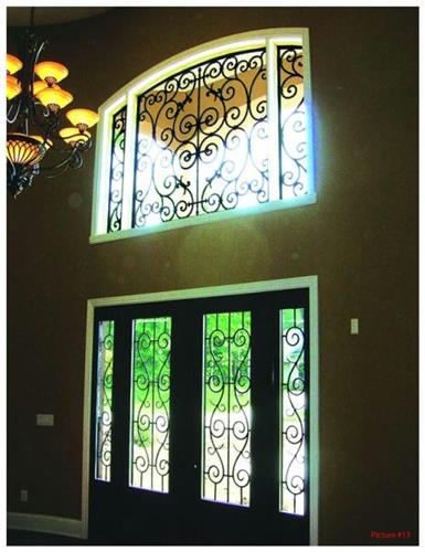 Tableaux Faux Iron Solutions is a perfect decorative solution for custom windows. It's a green product and is lightweight and more inexpensive than wrought iron! 