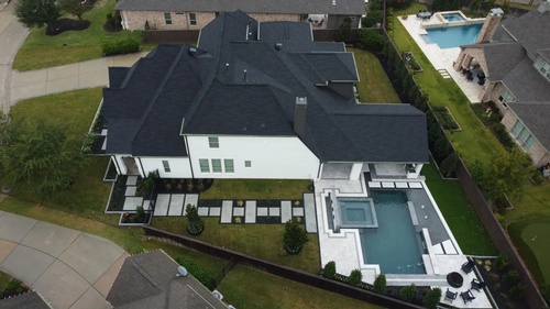 Gallery Image Roof-Replacement-GAF-Master-Elite-Golden-Pledge-warranty-charcoal-timberline-hdz-luxury-home-montgomery-side-view%20(1).jpg