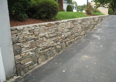 Gallery Image 01-Stone-Wall-Installed-by-Gerrior-400x284.jpg