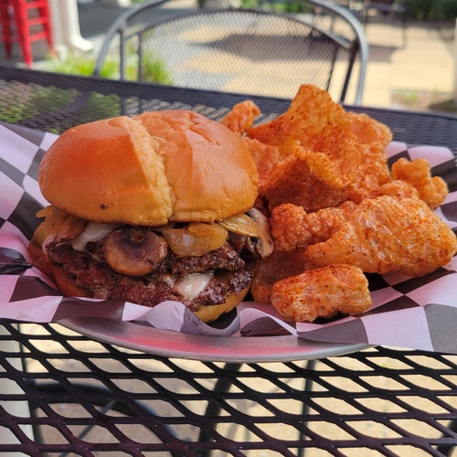 Mushroom Swiss! Two smashed patties topped with Swiss cheese, sautÃ???Ã??Ã?Â©ed onions and mushrooms, and All American sauce!