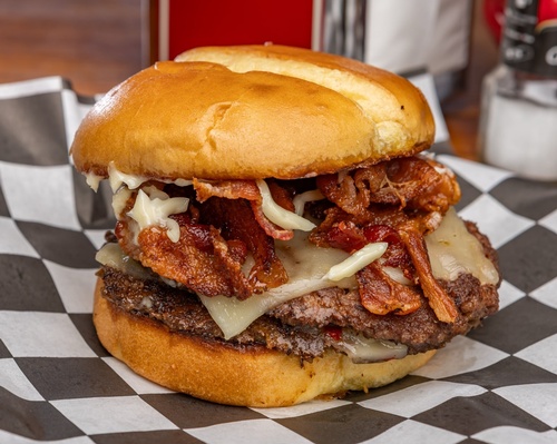 Today's forecast: OCBD Burger with a 100% chance of double patties, melty pepper jack, crispy bacon, bacon jam, and mayo on a toasted potato bun!