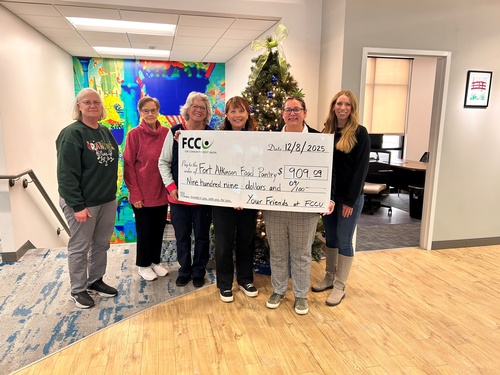 Fort Community Credit Union employees donate to the Fort Atkinson Food Pantry