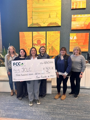 Gallery Image 12.11%20FCCU%20Donates%20to%20Jefferson%20County%20Literacy%20Council.jpg