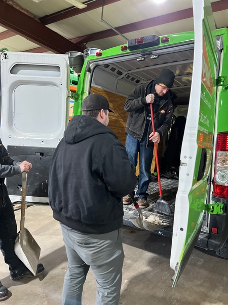 Cleaning out our vehicles to prepare for another day of restoring!