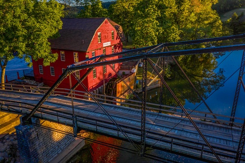 Gallery Image War-Eagle-Mill-and-bridge-aerial-scaled.jpg
