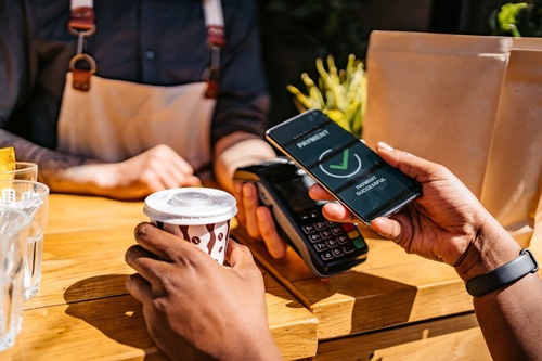 Gallery Image Woman-paying-via-contactless-channel-by-mobile-banking-application-1311147432_1258x838-min.jpg