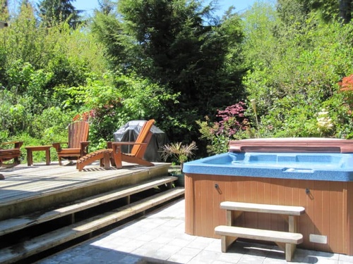 Gallery Image outdoor-hottub-with-forested-patio_tofino_pacific_coast_retreats.jpg