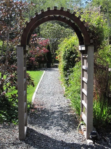 Gallery Image walkway-through-arch_tofino_pacific_coast_retreats.jpg