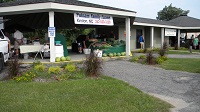 Pride support for landscaping, painting and other physical improvements have turned a forlorn Farmers Market into an exciting shopping destination with guidance of the Lenoir County Cooperative Extension Center