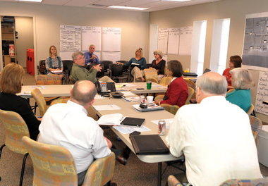 Members of the Coastal Resiliency Coalition meet in the ''War Room'' at Meyer Realty in March 2011. (Press-Register/Jon Hauge)