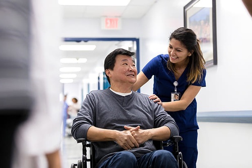 Gallery Image HCP-patients-nurse-with-patient-in-wheelchair_lo_96dpi.jpg