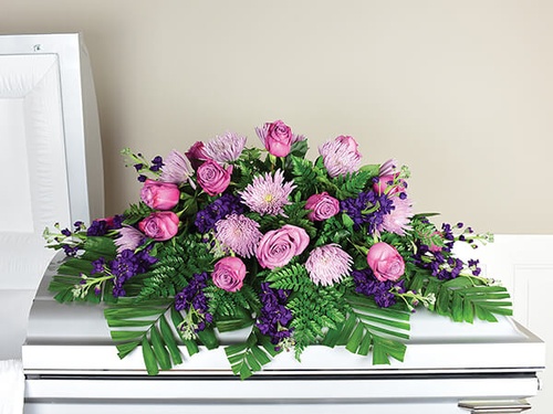 Gallery Image 493250-CasketSprayHalfPurple.jpg