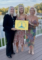 Gallery Image tcfl%20Elin%20Hilderbrand%20with%20card.jpg