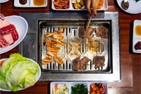 Gallery Image CM%20Hot%20Pot%20and%20grill%20table.jpg