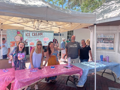 Jason Short volunteers with Chamber's Ice Cream Stroll and Pup Walk