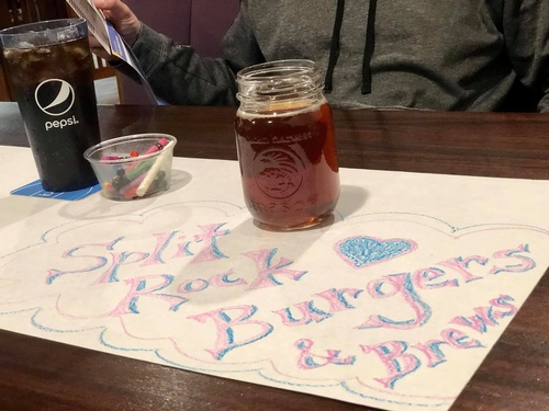 Coloring on Table Covers (Photo Credit: Erica Volkir)