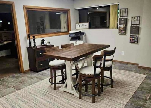 Gallery Image 717%20E%20Main%20St%20Suite%20A%20-%20Real%20Estate%20Retrievers%20table%20(photo%20from%20their%20fb%20page%202025).jpg