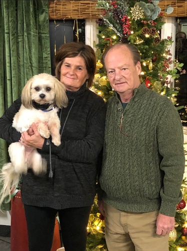 Owners Cindy Ahlers & Mike Rustad (with Henry) (photo by Erica Volkir)