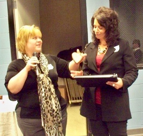 Michelle Cheeseman receiving 2012 Chamber President Award