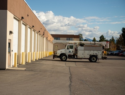 A Co-op bucket truck waits in the pole yard to be dispatched. 