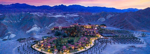 Gallery Image 1270x460-inn-aerial-dusk.jpg