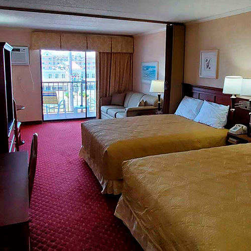 Motel Room with two Queen Beds and full sized sleep sofa