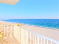 A view of Paradise from your vacation rental balcony. Sugar-white sand and turquoise waters.